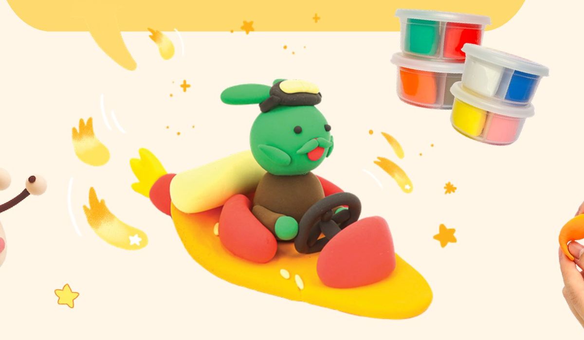 A clay character driving a clay rocket car beside tubs of clay